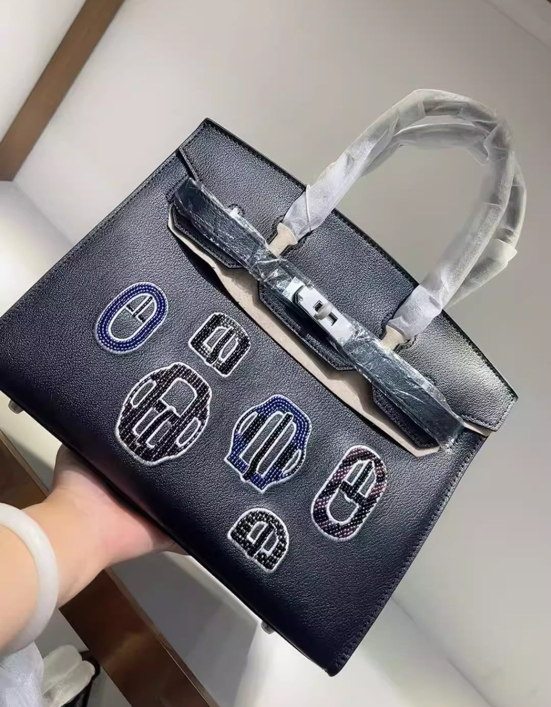 Embroidered Buckle Leather Bag